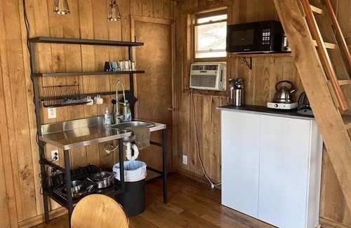 Slade House | Bird Nest Cabin: A Charming Hideaway Close to Natural Bridge, Dining, and Trails