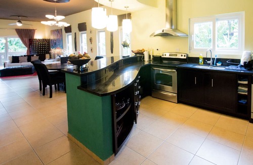 Antoneys Cay Condo | Luxury Waterfront Condo w/ Pool, Dock, and Gardens