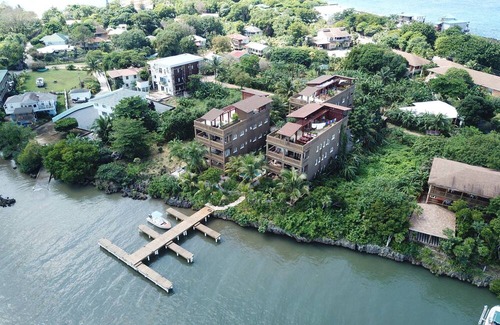 Antoneys Cay Condo | Luxury Waterfront Condo w/ Pool, Dock, and Gardens