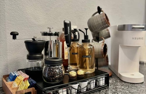 Englewood Apartment | French Inspired Stay Fireplace Coffee bar Cozy