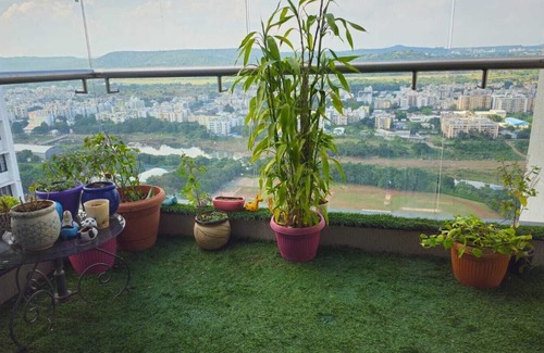 Nanded Apartment | Luxurious 2-bedroom apartment in serene Pune with view, WiFi, AC, recliner