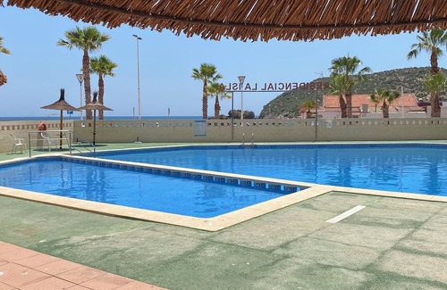 Puerto de Mazarron Apartment | Accessible apartment 50 metres to beach ,large communal pool, sea view balcony