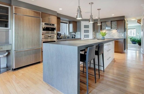 Calgary House | Inner-city Calgary Home with Hot Tub - 2 minutes to downtown!