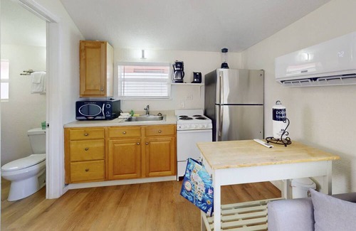 Madeira Beach Cottage | Studio Cottage Next to Johns Pass Village. Easy Beach Access. Heated Pool. Quiet and Private.