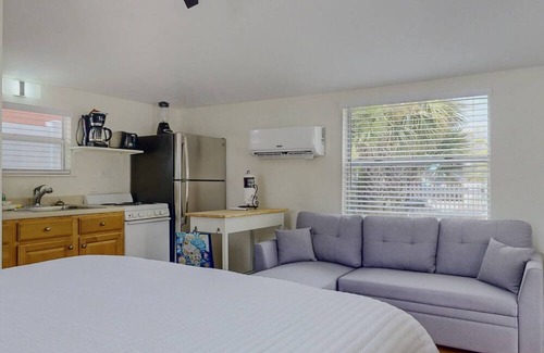 Madeira Beach Cottage | Studio Cottage Next to Johns Pass Village. Easy Beach Access. Heated Pool. Quiet and Private.