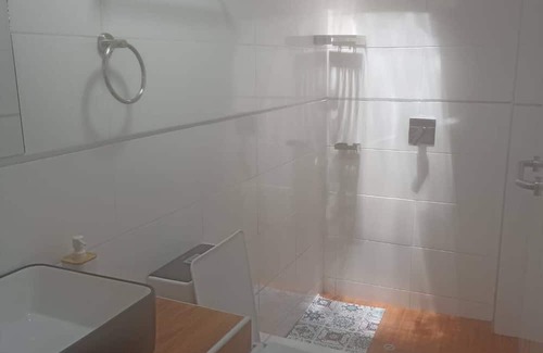 Puno House | Cozy room with TV and private bathroom