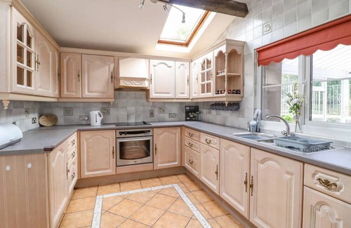 Fairbourne House | A peaceful picturesque landscape from a stunning stone built exterior.