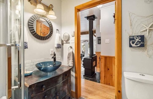 Queens Cottage | Lakefront cottage with sandy beach, great decks, beautiful sunrise.