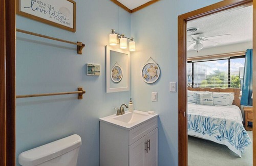Salvo House | Enjoy a classic Hatteras Island beach cottage with a sun deck!