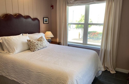 Southport Condo | Southport Yachty Dog! Spacious condo with water views and Pet-Friendly!