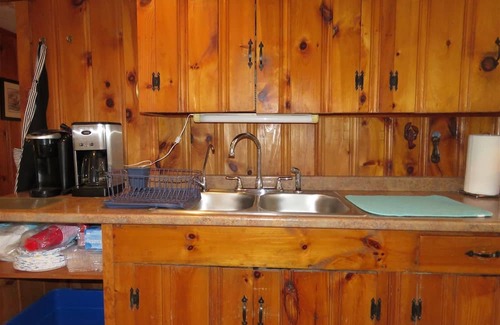 Sanford Cottage | Enchanting waterfront home offers comfort inside and out and promises enjoyment