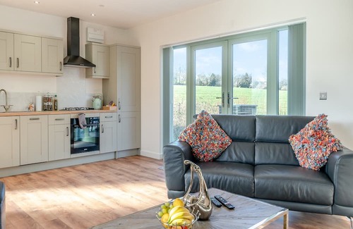 Coed-Y-Paen Cottage | Fox Acre is a stunning lodge with views over the rolling hills, perfect for a relaxing break away or