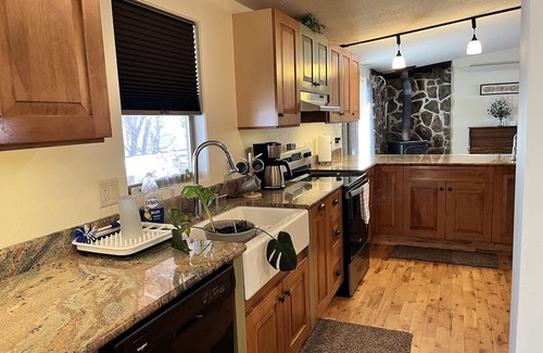 Freedom House | Newly remodeled home with a Barnwood rustic siding and an updated clean interior