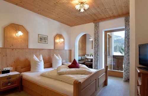 Koessen Apartment | Doppelzimmer mit Zusatzbett - Pension Gieringer