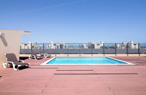 Olhao Apartment | Holiday Apartment "Rossi's Ap" with Sea View, Shared Pool & Wi-Fi