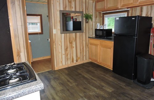 Malaga Cabin | Gotta Getaway Cabin 2 full beds with queen sleeper sofa