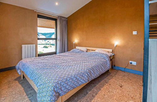 Marcoux Apartment | This beautiful and modern vacation home welcomes you with a breathtaking mountain view.