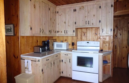 Raymond Cottage | Charming old-fashioned waterfront cottage on Panther Pond. Pet-friendly!