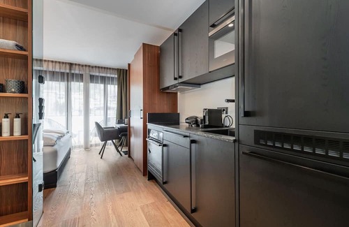 Kirchberg in Tirol Apartment | Cosy apartment for 4 guests with WIFI, pool, TV and terrace