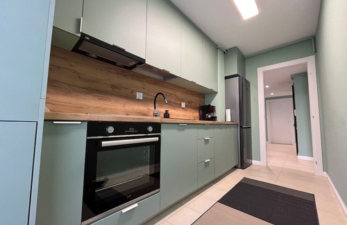 Stefanestii de Jos Apartment | Cosmopolis Family Apartment - Pools & Gym