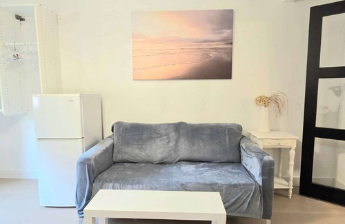 Steveston House | Guest Suite Studio One bedroom Large bathroom living room fenced yard Privacy