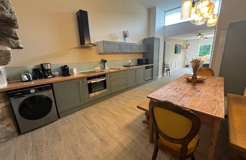 Plouneventer Apartment | Single-storey apartment with terrace in a 1520 mill