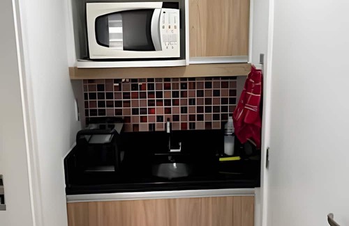 Jacarepagua House | Suite with mini kitchen and pool