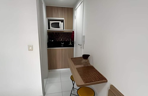 Jacarepagua House | Suite with mini kitchen and pool