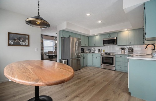 West Omaha House | Central Family Oasis, with Hot Tub & Fenced Yard!