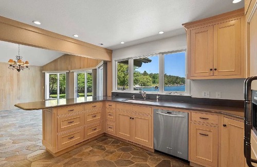 Lakeside House | Private Flathead Lake lagoon and dock, enjoy a spacious 5-bedroom Lakeside home.