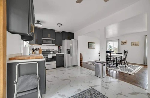 Oscoda House | Charming 3-bedroom house > 1 Mile to Lake Huron - AC & Pet Friendly!