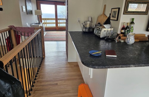 Cragsmoor House | A spectacular Shawangunk vista in a beautifully renovated chalet on a lush lawn.