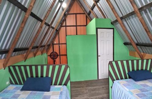 Fronteras Hotel | KARLITAS habitaciones, restaurante y Parquéo