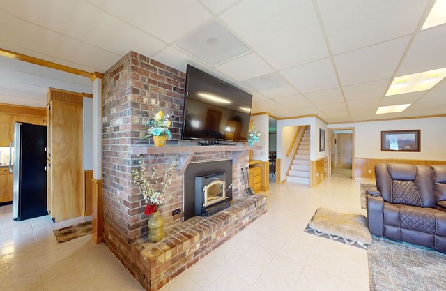 Beautiful riverfront home with private dock, patio, pool table, WiFi, and W/D