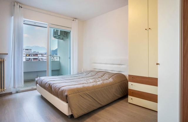 Apartment 'Appartamento Gardolo' with Mountain View, Balcony and Air Conditioning