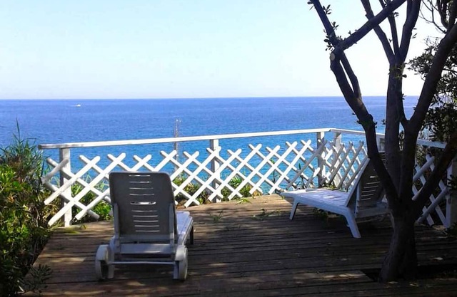 Villa with balcony, terrace and garden with sea views