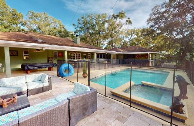 Spacious dog-friendly villa with pool, fireplace, patio, & games
