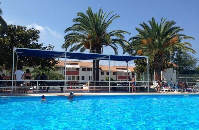 Holiday Apartment "Trilocale 31 Residence La Giungla" with Sea View, Shared Pool & Wi-Fi