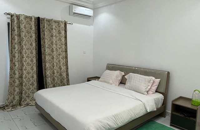Lovely 2-bedroom apartment in kotu near the fire service with AC
