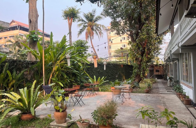 Bright and Cozy Bedroom with AC in a Stylish Thai House, Primary Location.