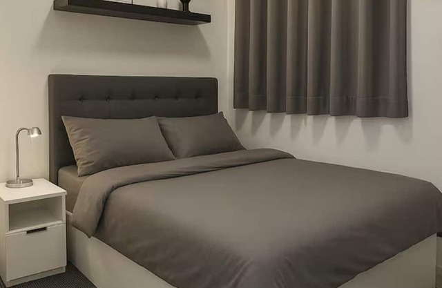 Lux 2BR Condo in Taguig with High-speed Internet, Disney, Washer and Pool