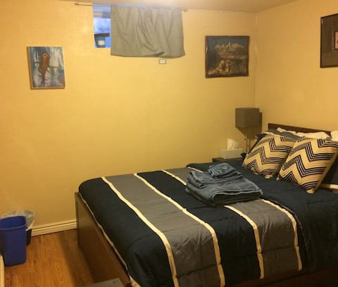 North Park Hill House | NE Park Hill room w queen bed, shared living rooms