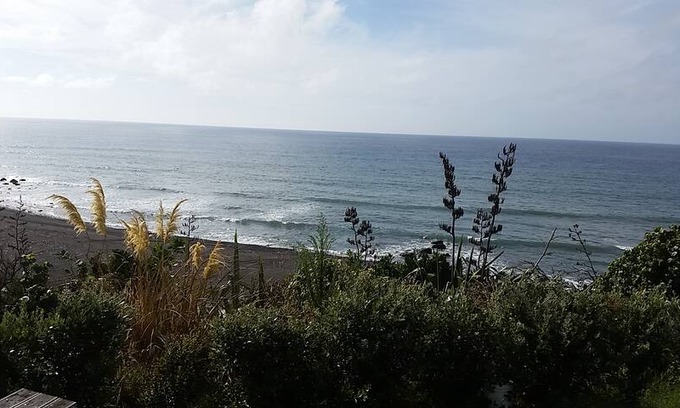 Okato Other | Beachfront stay. Room in shed.