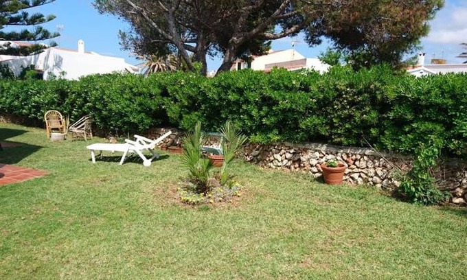 Cala Blanca Apartment | Apartamento acogedor,con jardín, al lado del mar.