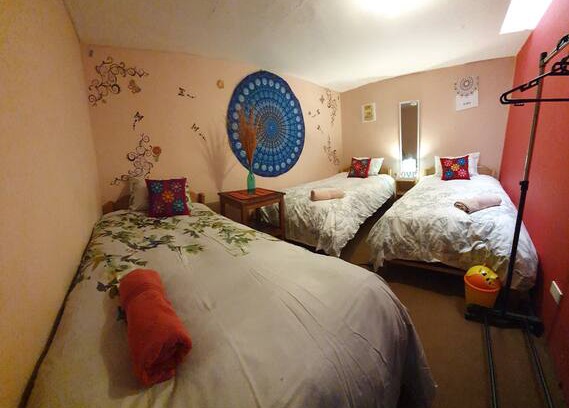 Cusco Historic Center House | Habitación triplex en KARMAWASI