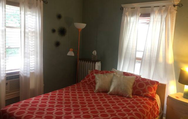 Whittier House | Queen bed in sunny bedroom