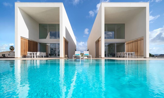 Belnem Villa | CARAIBAS fully air-conditioned vacation design villa with 20m lap pool