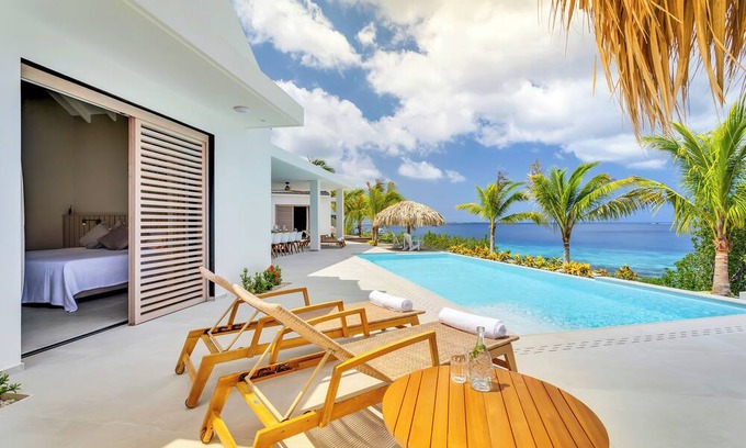 Sabadeco Villa | Villa Viteau, New! Luxurious oceanfront villa with private cinema