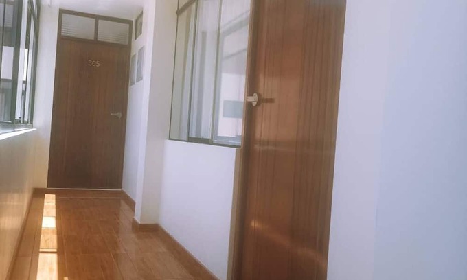 Puno House | Cozy room with TV and private bathroom
