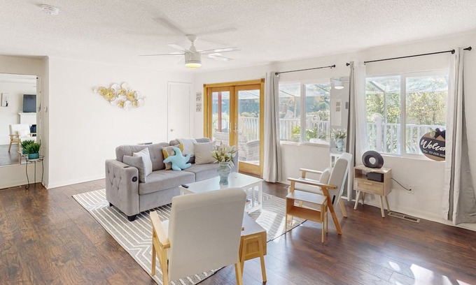 Shoreline House | Dog-friendly lake view getaway with a full kitchen, sunroom